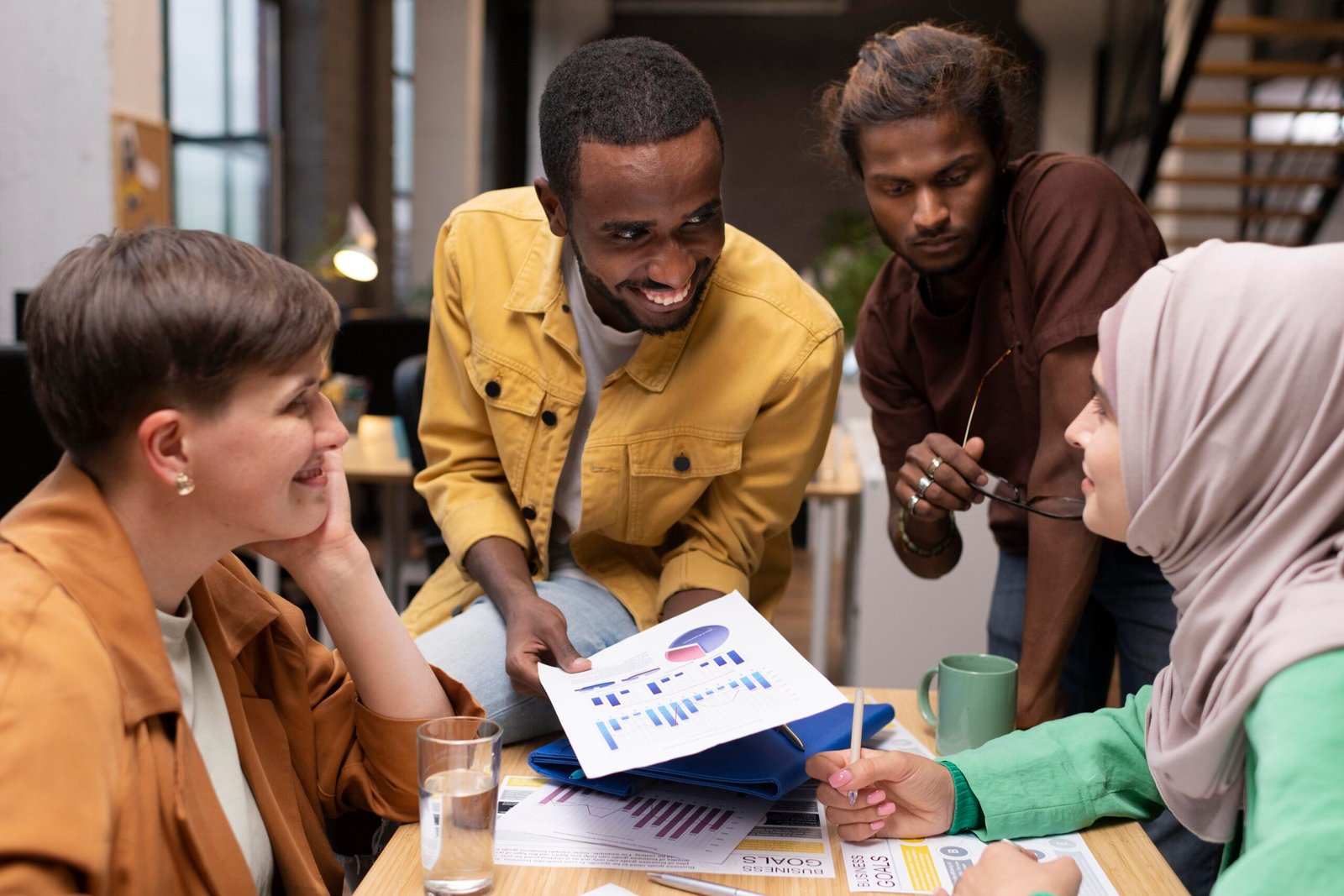 close-up-happy-colleagues-table